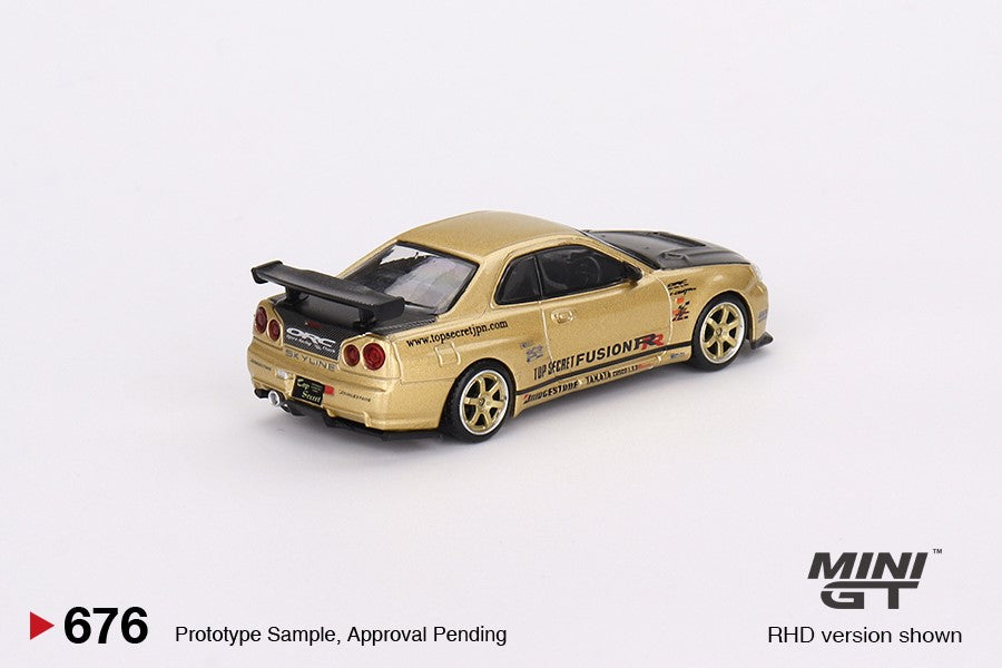 Mini GT Nissan Skyline GT-R (R34) Top Secret  Top Secret Gold - Japan Exclusive